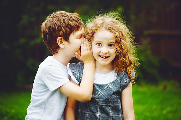 little-boy-and-girl-whispers-pic