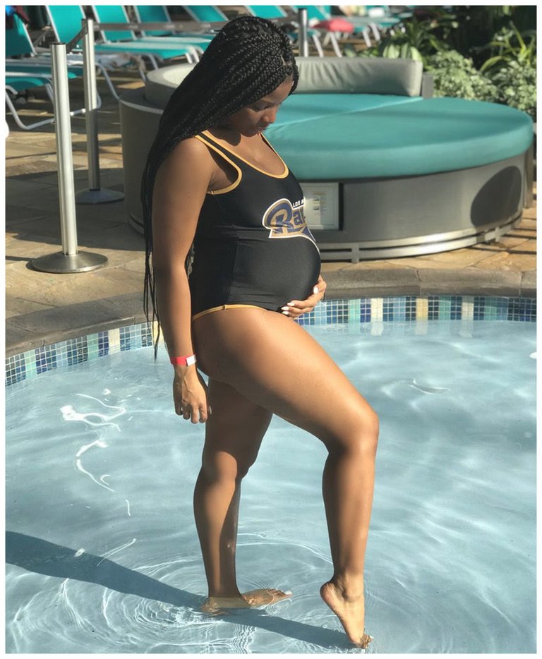 pregnant shiny swimsuit.jpg