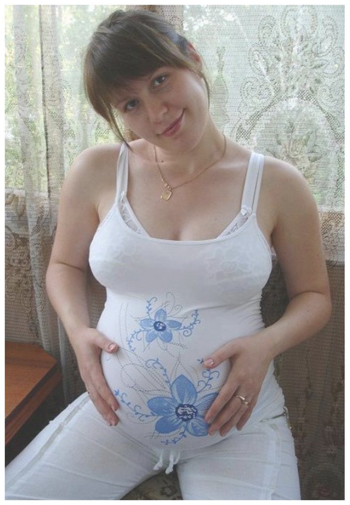 pregnant wearing tight white pan