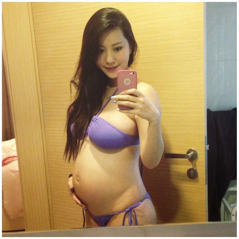 pregnant purple bikini.jpg