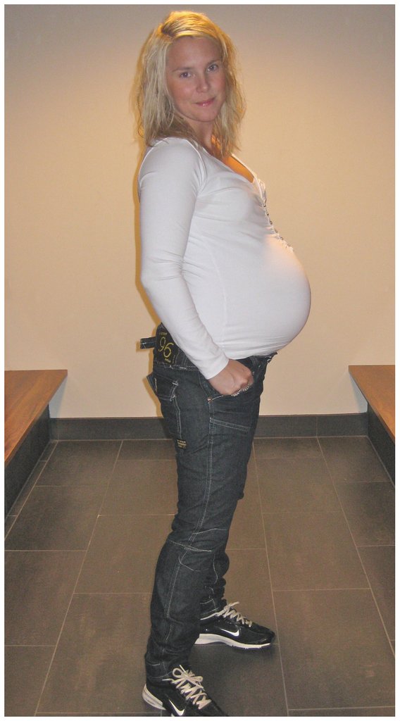 pregnant jeans and white top.jpg
