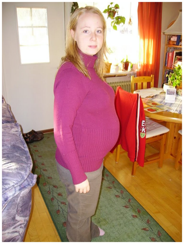pregnant pink sweater.jpg