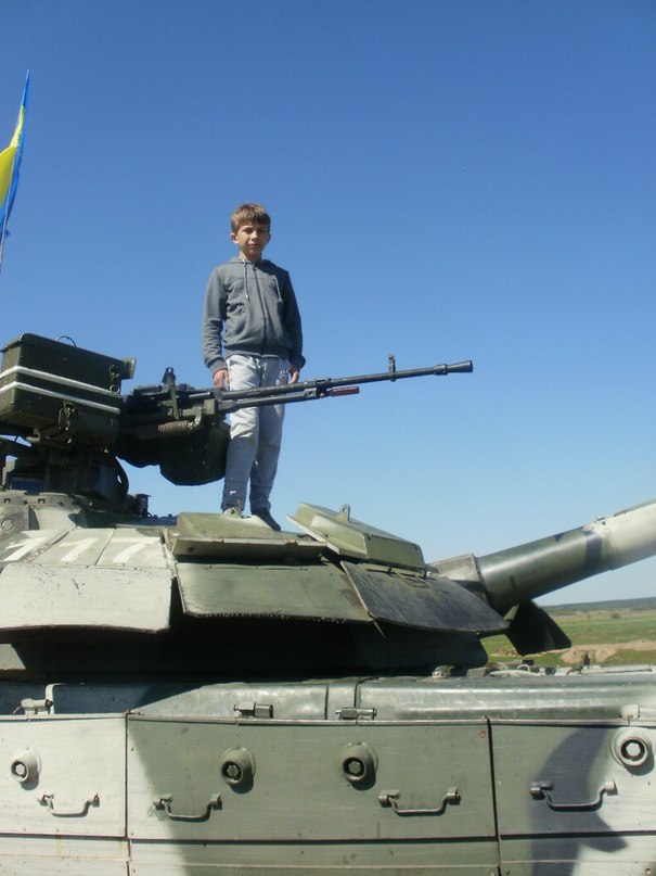 Boy On Tank