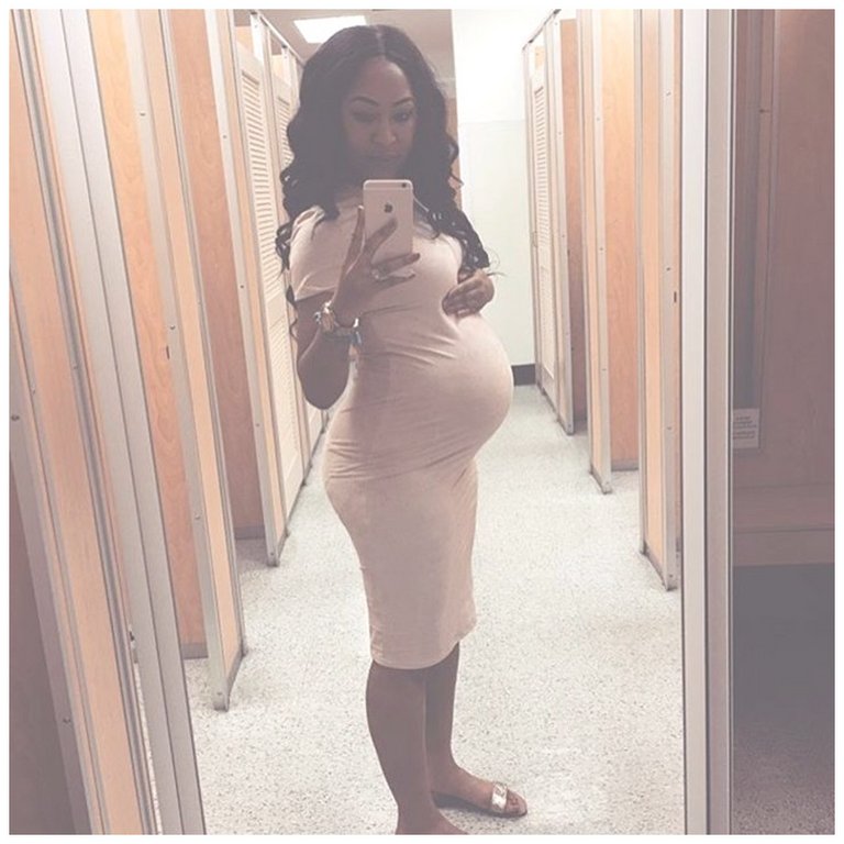 pregnant in dressing room.jpg